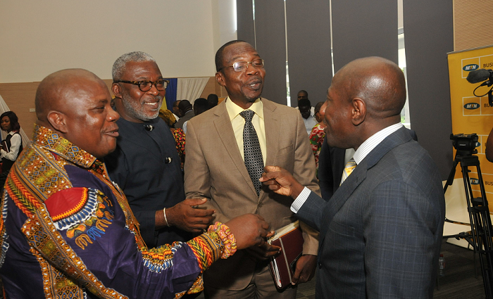  Mr Ebenezer Twum Asante (right) interacting with some participants after the forum. Among them are Mr Ransford Tetteh (left), the Editor of the Daily Graphic, Mr Kofi Kapito and Mr Affail Monney, the President of the Ghana Journalists Association (GJA). Picture: EBOW HANSON